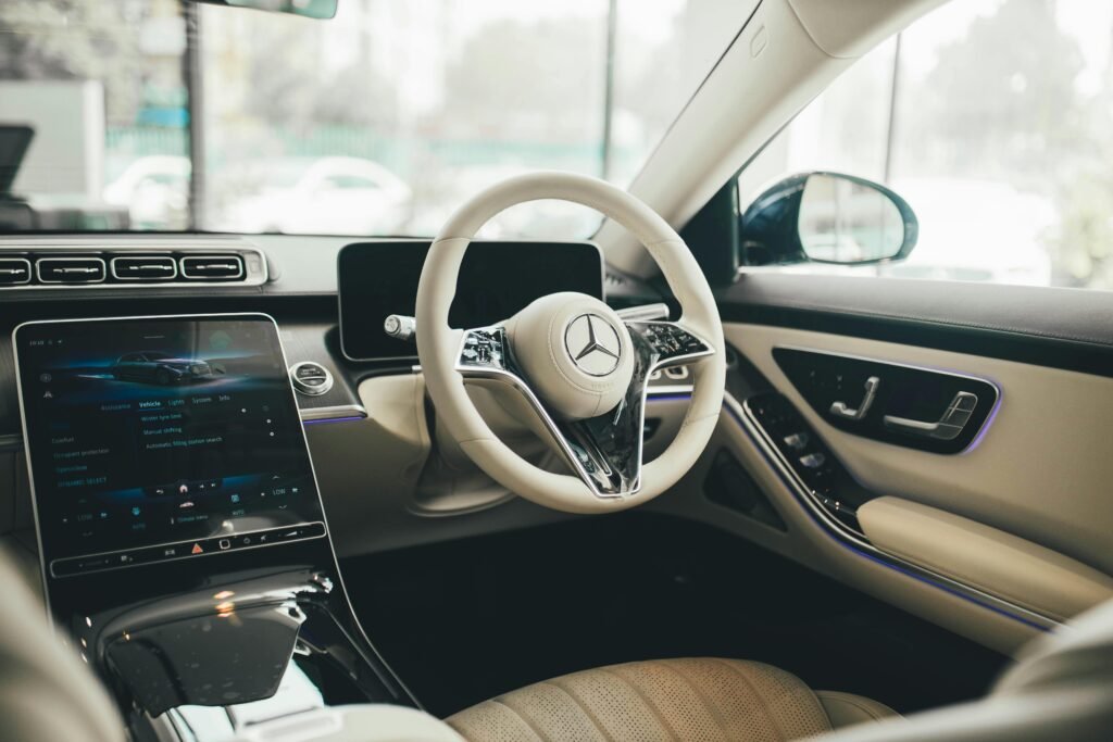 Automobile: All the Stats, Facts, and Data You'll Ever Need to Know Elegant Mercedes car interior showcasing modern technology and luxury in New Delhi.